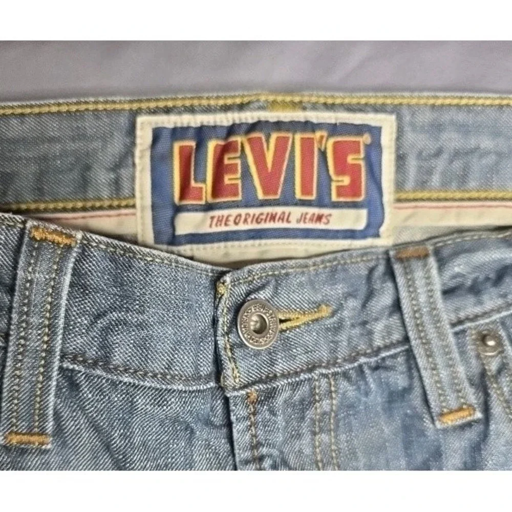 Men's 2000's Levi's 514 Slim Straight Leg Light Medium Wash Jeans 34x34
